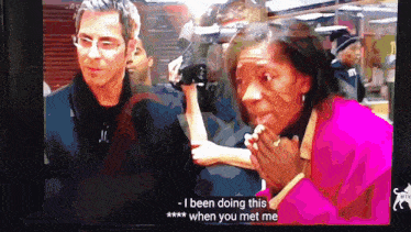 a tv screen shows a man and a woman and the woman says i been doing this *** when you met me