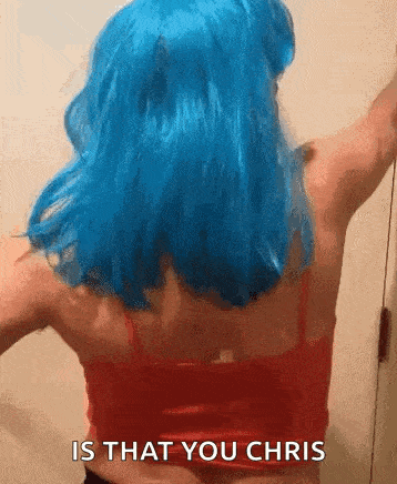 a woman with blue hair is wearing a red tank top and a blue wig and says is that you chris .