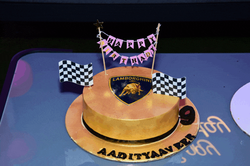 a birthday cake with lamborghini on it