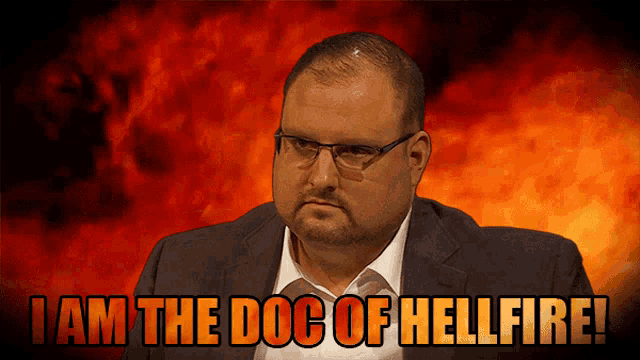 a man with glasses and a beard says " i am the doc of hellfire "