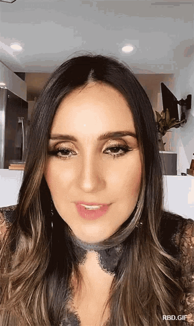 a close up of a woman 's face with the words rbd.gif below