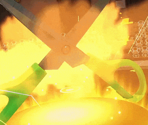 a pair of scissors with a green handle are cutting through a yellow object
