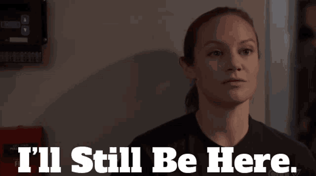 a woman says i 'll still be here in front of a fire alarm