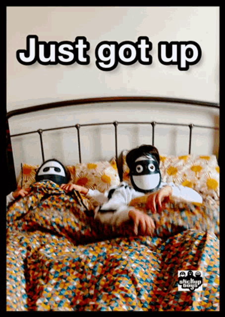 a poster that says just got up with two people laying in bed