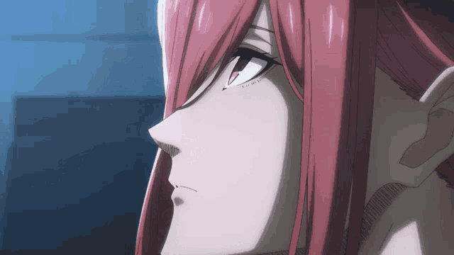 a close up of a woman with red hair