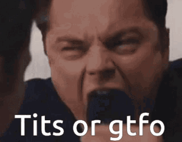 a close up of a man 's face with the words tits or gtfo written below him .