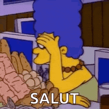 a cartoon character from the simpsons is sitting at a table with a bunch of food and holding her head .