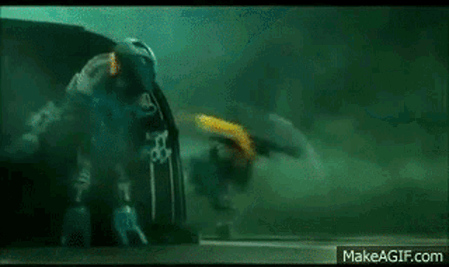 a jet is flying through the air in a dark room .