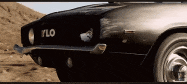 a black car with the letters ylo on the front