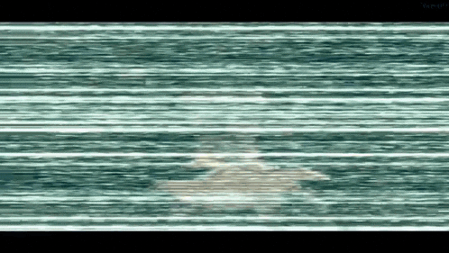 a person is swimming in the water with a blurred background of waves .