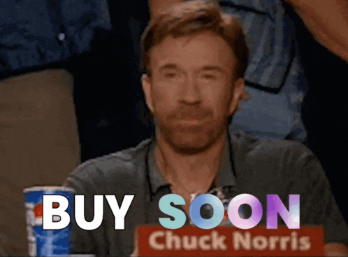 a man with a sign that says buy soon chuck norris