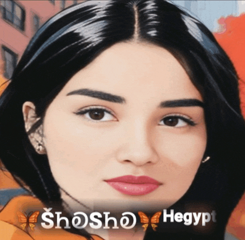 a close up of a woman 's face with the words shosho hegypt on the bottom right