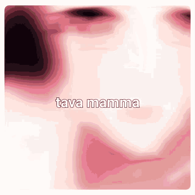 a close up of a person 's face with the words tava mamma written above it .
