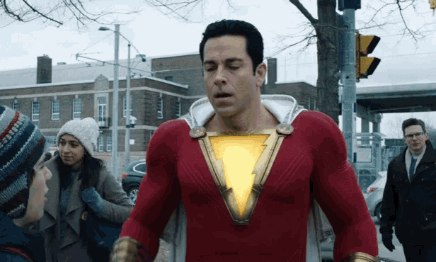 a man in a red and gold superhero costume