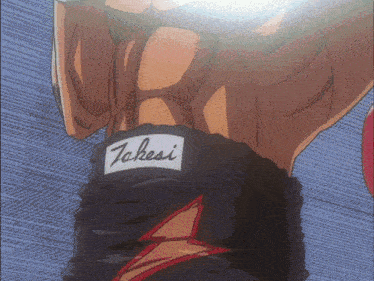 a man 's torso is shown with the name takesi written on his shorts