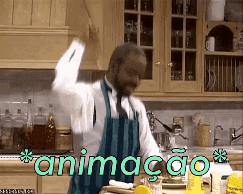a man in an apron is dancing in a kitchen with the word animacao written on the bottom