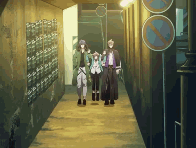 a group of people walking down a hallway with a no parking sign