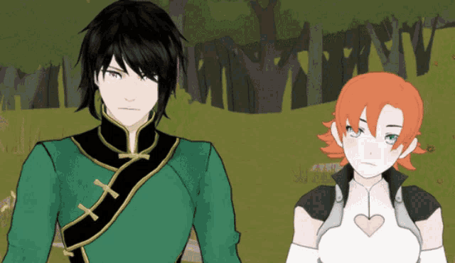 a boy and a girl are standing next to each other in a field