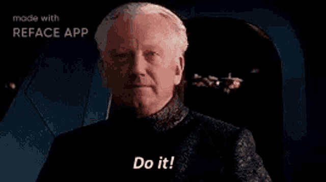 a man in a suit is sitting in a chair and saying `` do it ! ''