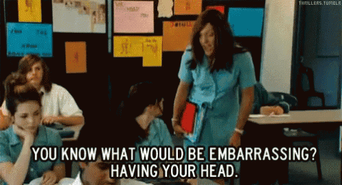 a group of people in a classroom with the words " you know what would be embarrassing ? having your head "