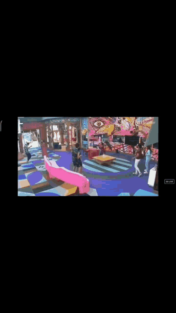 a man and a woman are dancing in a room