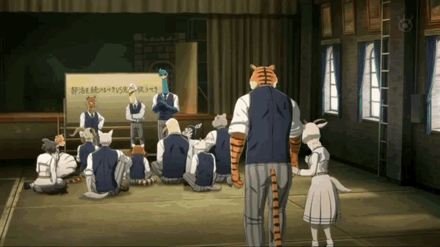 a group of animals are gathered in front of a sign that says ' a ' on it
