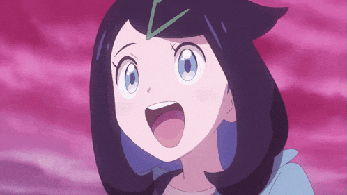a girl with black hair and blue eyes has a green x on her forehead