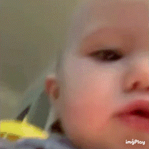 a close up of a baby 's face with the words love you on it