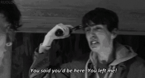 a man is crying while holding a gun and saying `` you said you 'd be here . you left me . ''