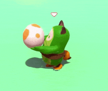 a green and orange cartoon character is holding a pink egg .