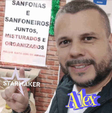a man in front of a sign that says ' sanfonas e sanfoneiros juntos misturados e organizados '