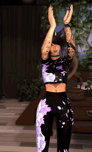 a woman with tattoos on her arms is wearing a black top with purple flowers