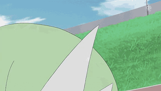 a green and white cartoon character is holding a black object in her hand