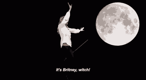 a woman is standing on a witch broom in front of a full moon in the dark .