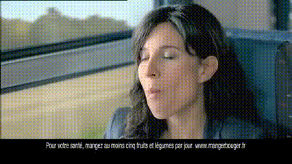 a woman is sitting on a train with her eyes closed and the words pour votre santé on the bottom right