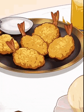 a cartoon drawing of fried shrimp on a plate on a table