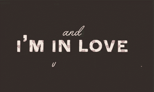 a sign that says ' and i 'm in love with you '