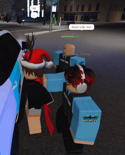 two roblox characters are standing next to each other and one of them is wearing a christmas hat