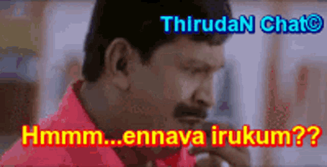 a man with a mustache is wearing a red shirt and says " hmm "