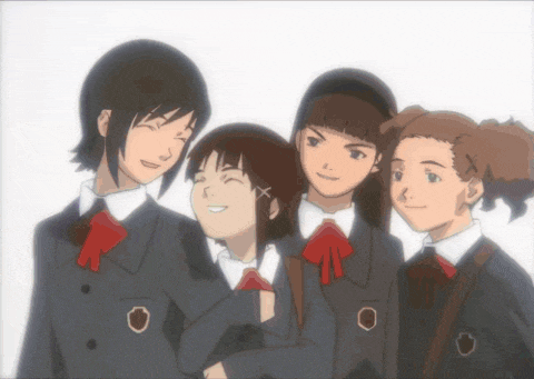 a group of girls are posing for a picture and one of them has an x on her hair