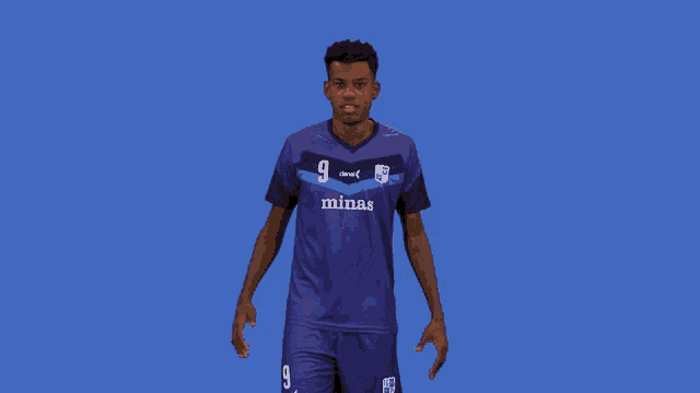 a young man wearing a purple minas jersey