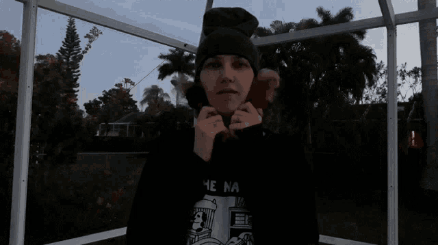 a person wearing a sweater that says he na on it