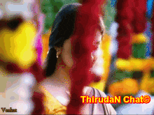 a blurred image of a woman with the words thirudan chat written on the bottom