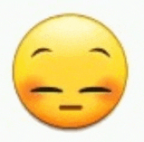 a yellow smiley face with its eyes closed and a slight smile on its face .