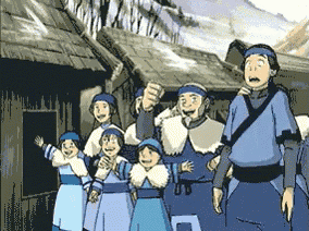 a group of people are standing in front of a wooden building