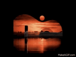 a guitar with a sunset in the background and makeagif.com written on the bottom