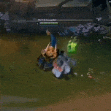 a person is playing a video game with a green cube on their head