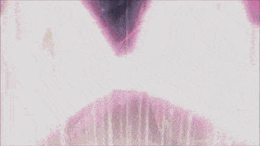 a close up of a girl 's face with sparkles around her