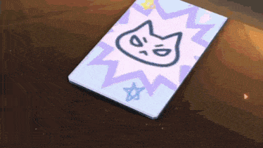 a drawing of a cat on a piece of paper