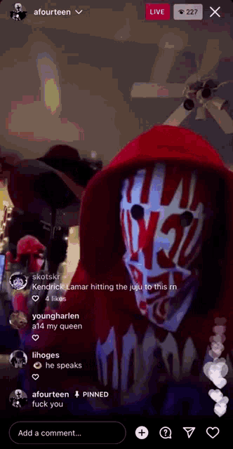 a screenshot of a live stream with a person wearing a mask that says w30